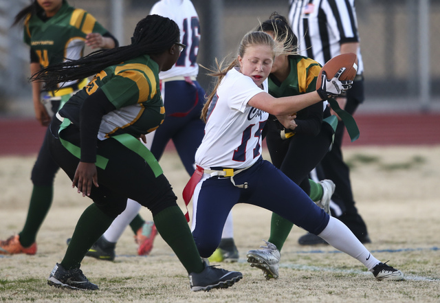 Coronado’s Sydnee Hansen (17) is tagged out by Rancho players during a flag football g ...