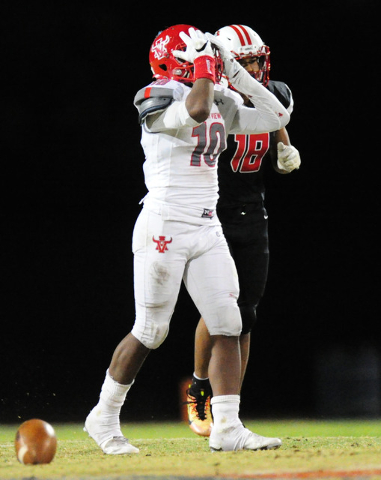 Arbor View linebacker Dekarri Gunn reacts after nearly intercepts a Liberty pass in the firs ...