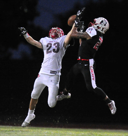 Arbor View defensive back Deago Stubbs breaks up a pass intended for Liberty wide receiver D ...