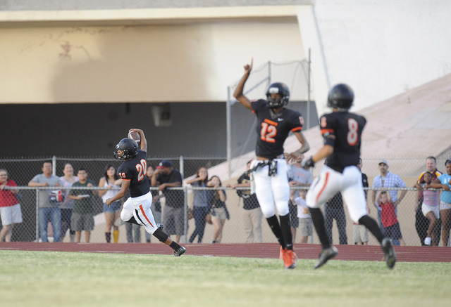 Chaparral kick returner Richard Nelson returns a kickoff 92 yards for a touchdown against El ...