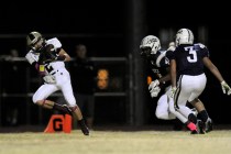 Faith Lutheran wide receiver Mark Rubalcaba (2) catches a 10-yard touchdown pass against Spr ...