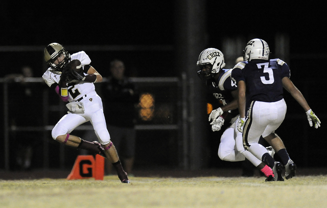 Faith Lutheran wide receiver Mark Rubalcaba (2) catches a 10-yard touchdown pass against Spr ...