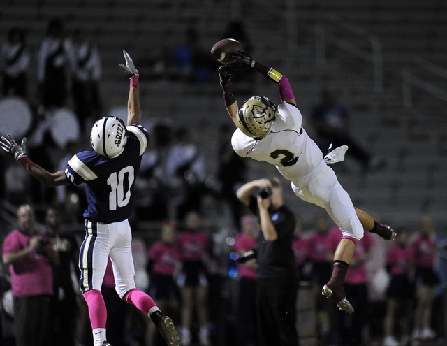 Faith Lutheran wide receiver Mark Rubalcaba (2) is unable to catch a pass as Spring Valley d ...