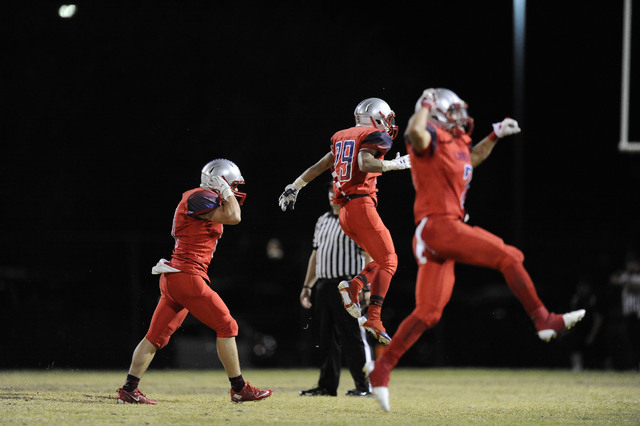 Liberty players celebrate after Coronado’s game-winning field goal attempt missed as t ...