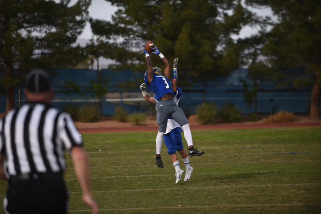 Desert Pines Antonio Wallace (3) attempts a catch against South Tahoe during their 3A state ...