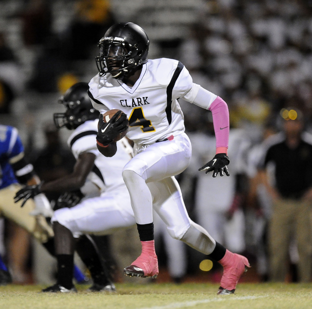 Clark wide receiver Isaiah Lyles-May returns a punt in the first quarter Thursday against Si ...