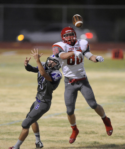 Arbor View linebacker Mitchell Durkee (88) breaks up a pass intended for Silverado wide rece ...