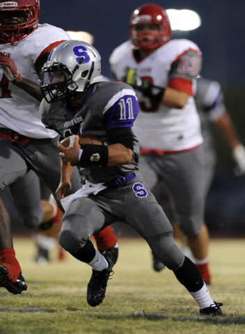 Silverado running back Jarrett Alipio (11) rushes for a first down against the Arbor View in ...