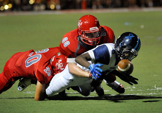 Canyon Springs’ Kujuan Casey fumbles the ball after making a reception with Arbor View ...
