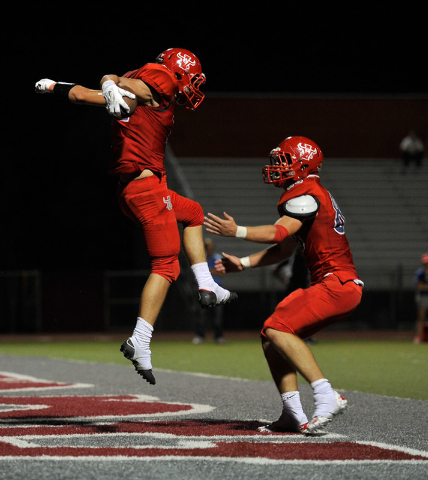 Arbor View’s Noah Noce, left, celebrates a touchdown with teammate Mitchell Durkee dur ...