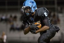 Canyon Springs’ Zaviontay Stevenson, carries the ball in the first half against Foothi ...