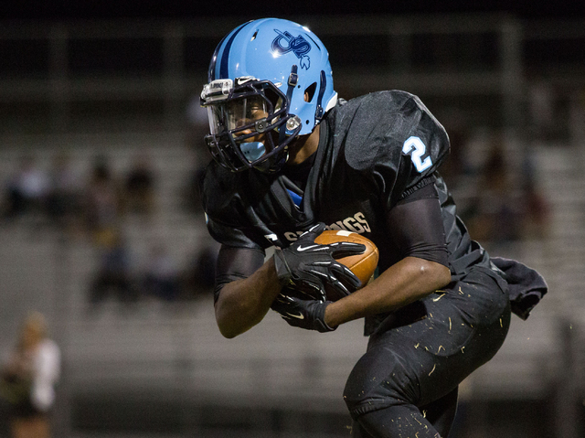 Canyon Springs’ Zaviontay Stevenson, runs the ball in the first half against Foothill. ...