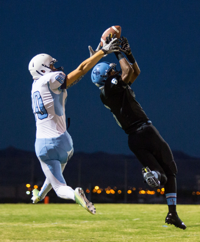 Foothill’s James Hagen and Canyon Springs’ Kasey Allison battle for the ball in ...