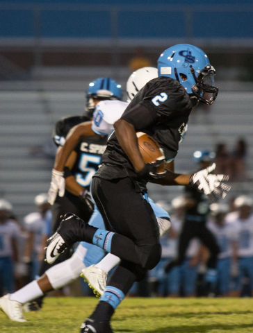 Canyon Springs’ Zaviontay Stevenson, runs for a touchdown in the first quarter against ...