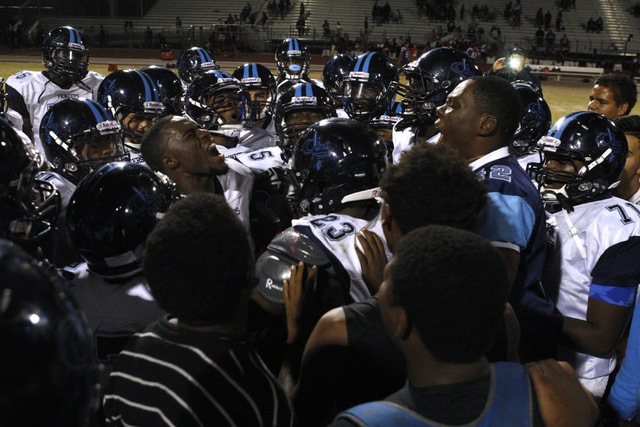 Canyon Springs players celebrate their 15-0 upset of Liberty on Thursday. (Sam Morris/Las Ve ...