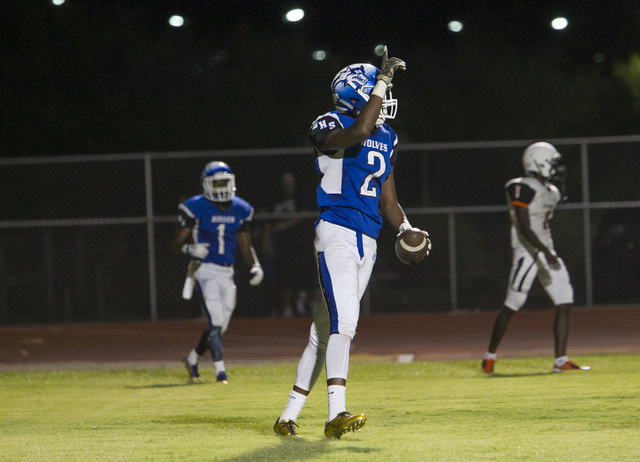 Basicճ De’shawn Eagles (2) celebrates after scoring a touchdown against Chaparra ...