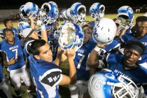 Basic player celebrates their victory over Chaparral following a varsity football game at Ba ...
