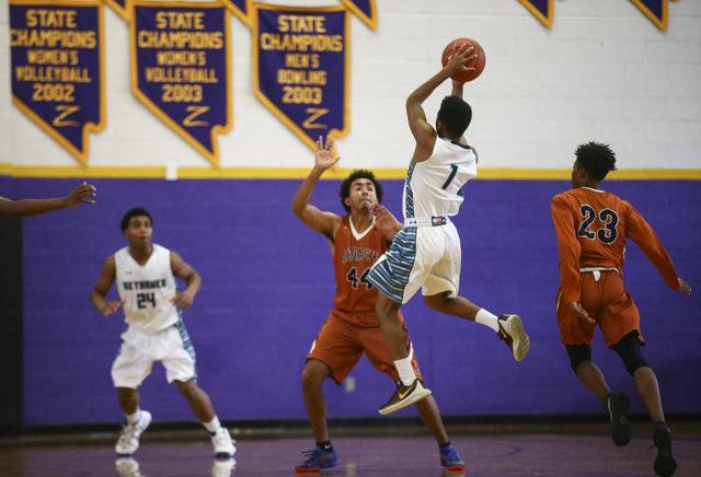 Silverado’s Dajon Keeling (1) looks to make a pass over Legacy during a basketball gam ...