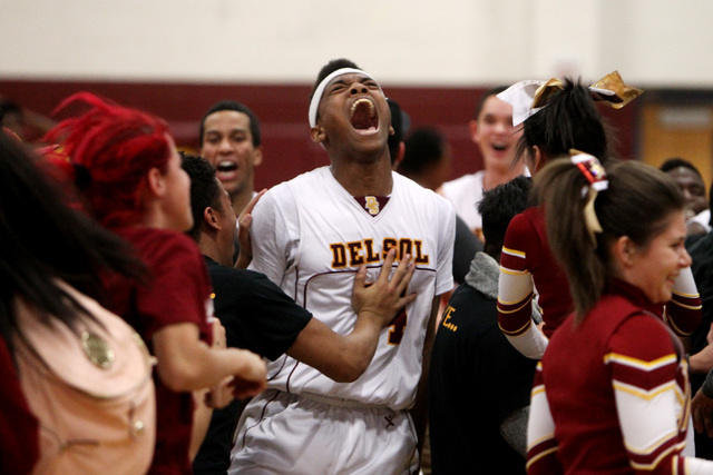 Del Sol forward Brian Greer celebrates a 61-58 victory over Chaparral on Friday. Greer had 2 ...