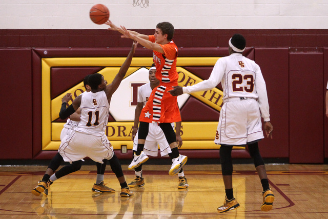 Chaparral guard Samuel Porras passes out of Del Sol coverage on Friday. Porras had 15 points ...