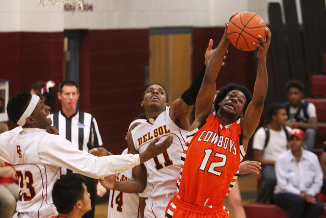 Chaparral center Maharie Trotter grabs a rebound from Del Sol forward Jonathan Spearman on F ...