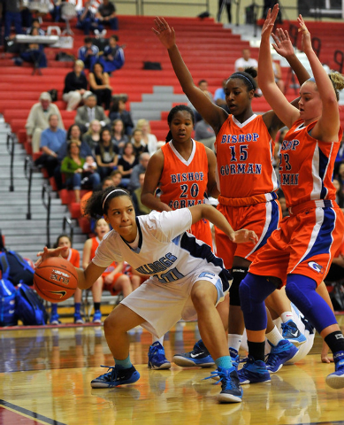 Centennial guard Jayden Eggleston, left, is swarmed by Bishop Gorman’s Samantha Coleman (2 ...