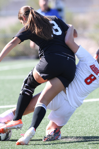 Palo Verde’s Alexis Lloyd (8) and Arbor View’s Breanna Larkin (8) collide while ...