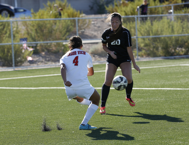 Palo Verde’s Hannah Coleman (20) moves to block a kick by Arbor View’s Katelyn L ...