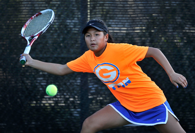 Bishop Gorman’s Amber Del Rosario goes for a forehand during the Sunset Region girls s ...