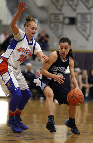 Centennial’s Simone Barber drives against Bishop Gorman’s Megan Jacobs on Friday ...