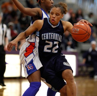 Centennial’s Teirra Hicks drives by Bishop Gorman’s Maddison Washington during t ...