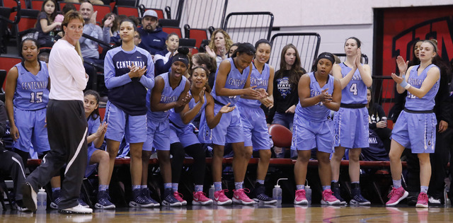Centennial players cheer during the first half of a Class 4A girls state final game at the C ...
