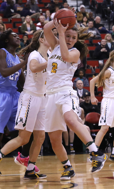 Bishop Manogue’s Maddie Camacho (2) recovers a rebound during the first half of a Clas ...