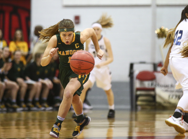 Bishop Manogue guard Katie Turner (1) drives the ball against Foothill during the Class 4A g ...
