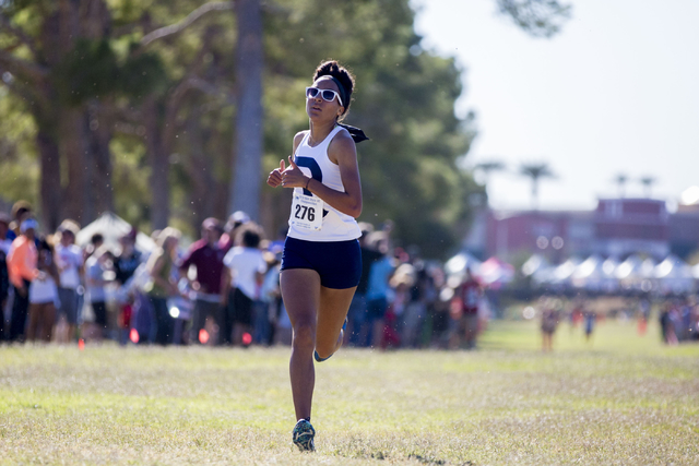 Samantha King-Shaw, Reed High School, encloses on the finish line of the 3.1 mile in the 201 ...