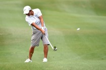 Foothill High School senior golfer Andrew Chu takes a second shot from the 13th fairway duri ...