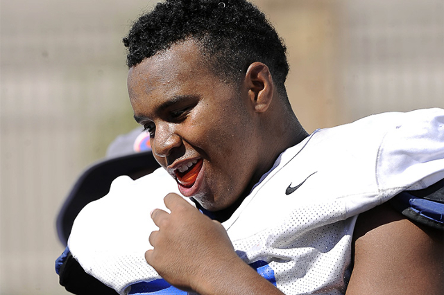 Bishop Gorman senior lineman Jackson Perry rests during practice on Wednesday. The 6-foot-3- ...