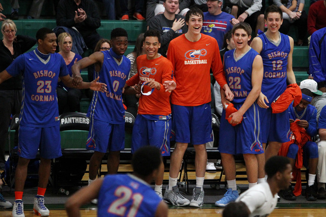 Bishop Gorman players celebrate a dunk by forward Deon Whiteside to finish their game agains ...