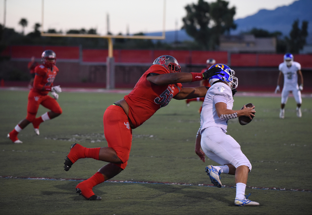 Arbor View’s Greg Rogers (56) tackles an Orem player during their football game played ...