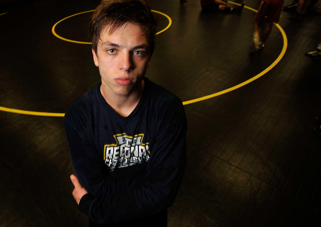 Faith Lutheran wrestler Owen Lawrie poses during a short break from training at Faith Luther ...