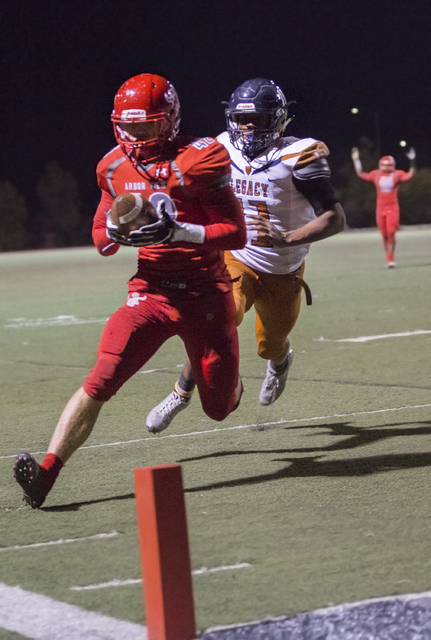 Arbor View’s Andrew Wagner (42) scores a second quarter touchdown during the Sunset Re ...