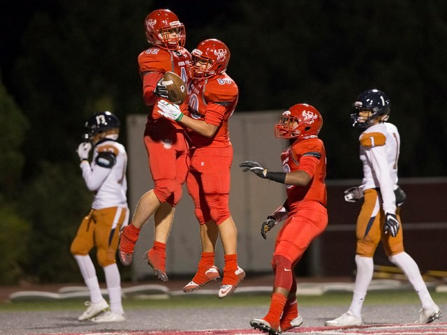 Arbor View’s Andrew Wagner (42) celebrates with Robert Linero (80) after scoring a fir ...