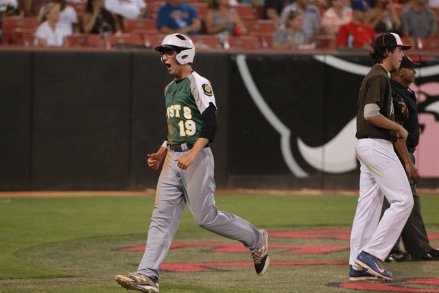 Rancho player Richard Coughlin (19) celebrates after scoring a run against Bishop Gorman dur ...