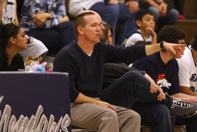 The Meadows head coach Gary Hannig directs his team during their game against Lincoln County ...