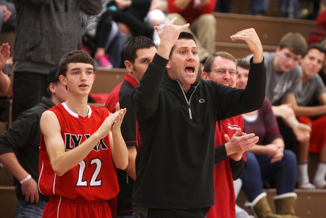Lincoln County coach Matt Cameron calls his players over during their game Saturday at The M ...