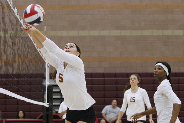 Mojave girls volleyball player RayEna Rael sets the ball during their match against Faith Lu ...