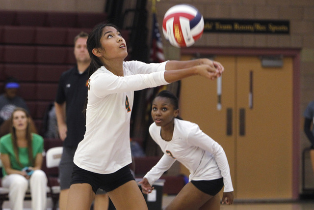 Mojave girls volleyball player Carissa Limtiaco passes a ball during their match against Fai ...