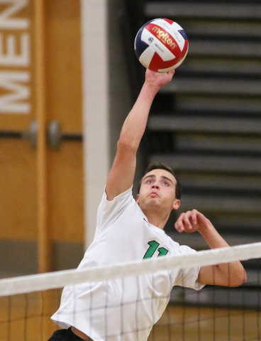 Palo Verde’s Michael Simister spikes the ball during a volleyball game against Green V ...