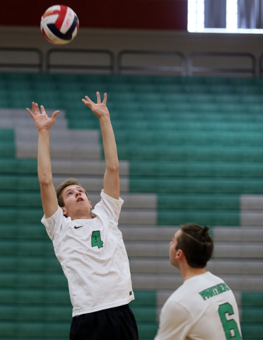 Palo Verde’s Cole Willson, left, sets up Parker Nelson during a volleyball game agains ...