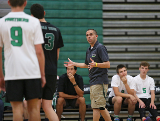 Palo Verde coach Phil Clarke, center, speaks to his team during a volleyball game against Gr ...